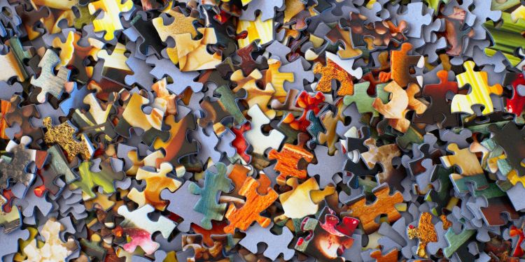 Lots of unmatched jigsaw pieces
