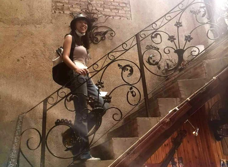 A person walking up a set of stairs