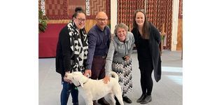 Prof Johanna Stiebert third left) and Dr Emily Colgan (4th left) and two others (+ dog) at Trinity College, Auckland.