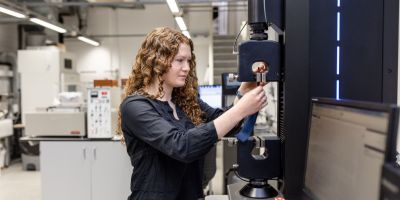 Kate Morris, PhD researcher at the University of Leeds, testing materials for durability.