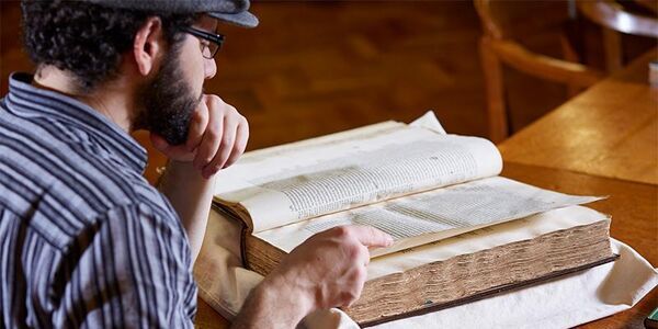Student in Special Collections library