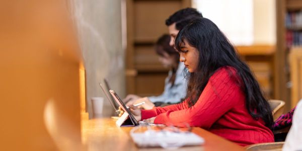Ahc student in library facilities and support resized
