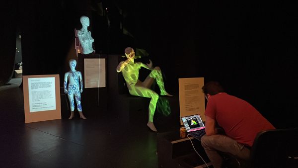 Mannequins in a dark room