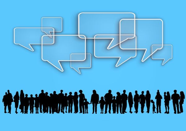 A row of silhouettes of different people. Above them are cartoon speech bubbles.