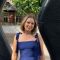 Alice Spall smiling into the camera on campus.