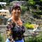 Bev Adams with Holmfirth in the background