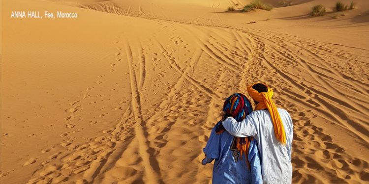 Two people looking out at the desert landscape in Fes, Morocco