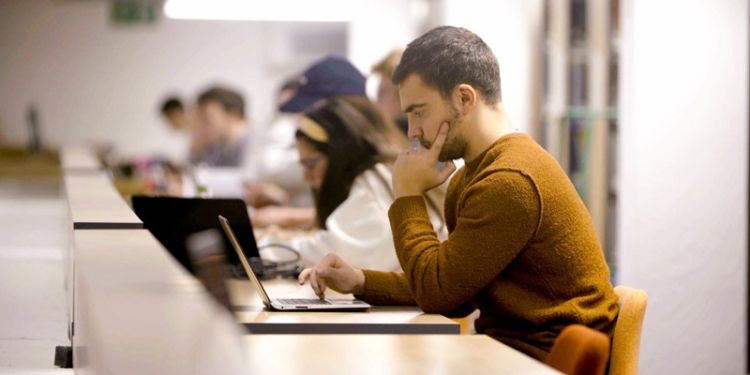 Student working on a laptop.