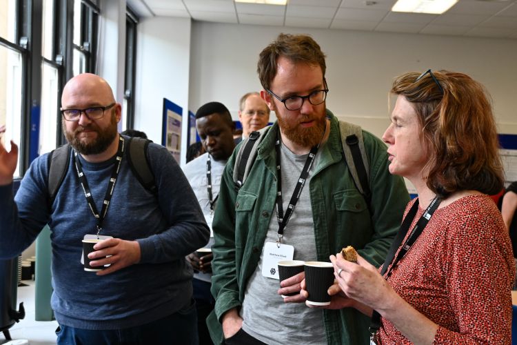 Three researchers take a break from the conference 
